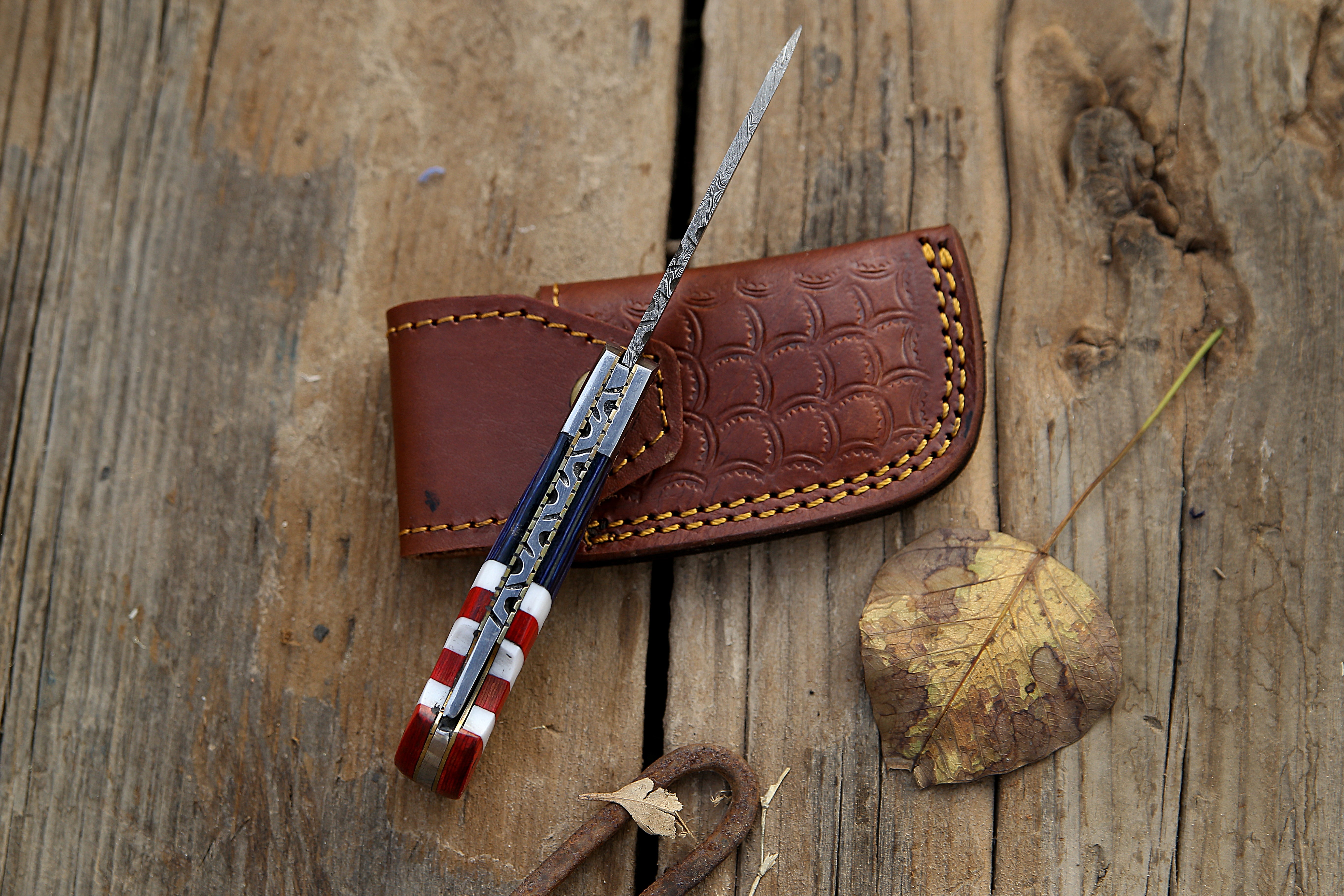 American Flag Handle Back Lock 6.8" Handmade Damascus steel Folding Knife Personalized Folding Knife Sharp cutting edge File work on the spine with Leather pouch.