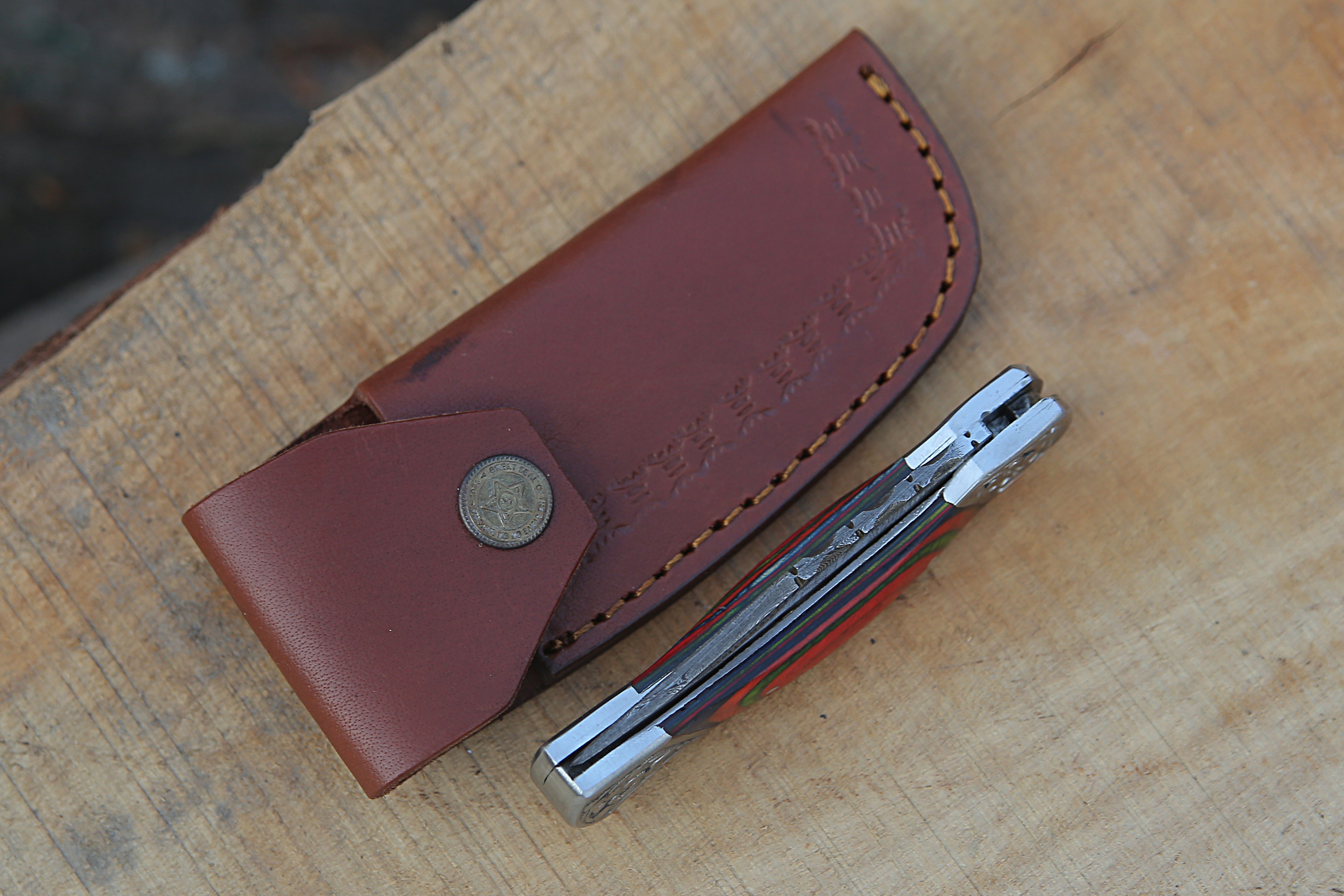 Back Lock Handmade Damascus Steel Pocket Knife Multicolor Pakka Wood Handle Folding Knife With Engraved Steel clips.