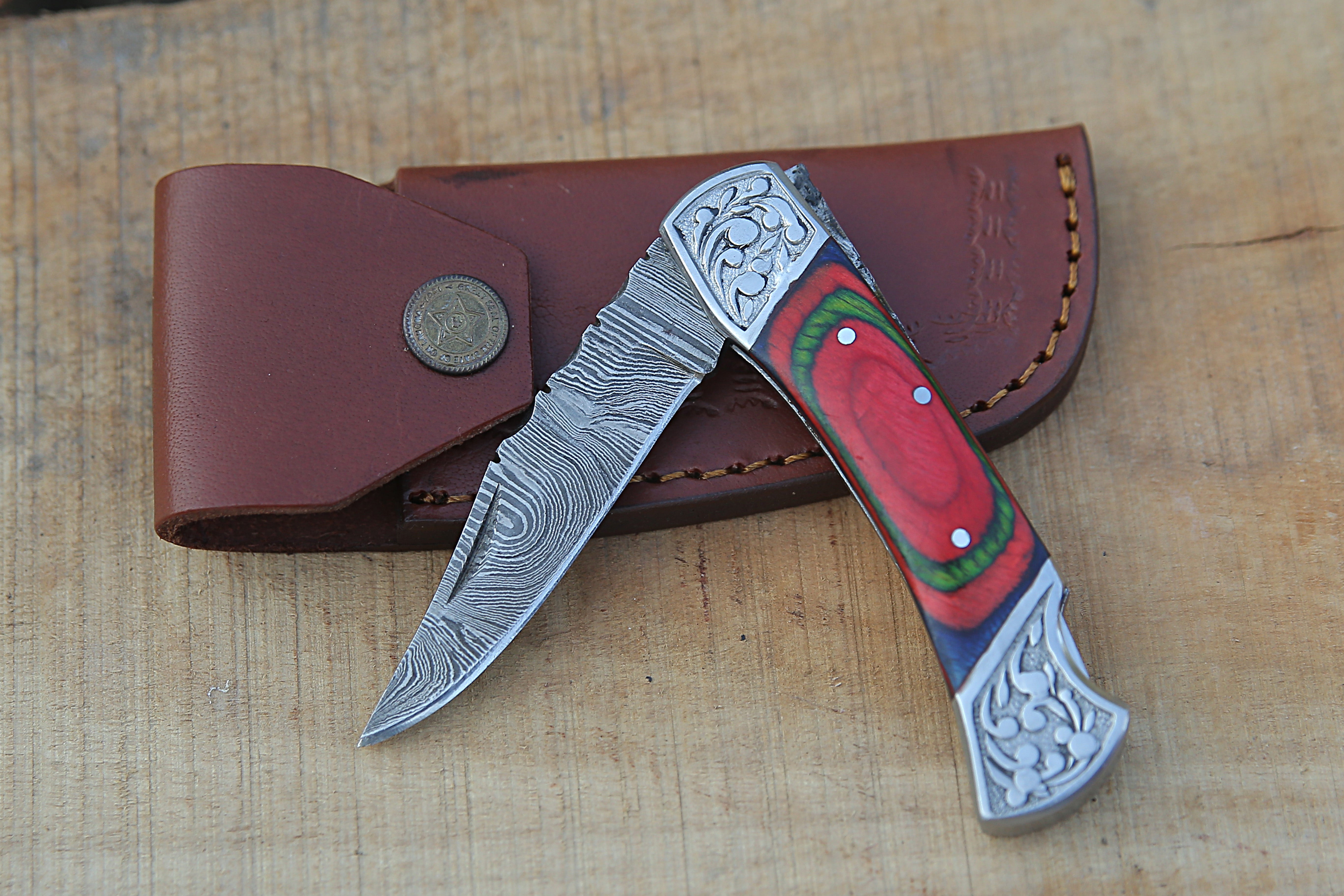Back Lock Handmade Damascus Steel Pocket Knife Multicolor Pakka Wood Handle Folding Knife With Engraved Steel clips.