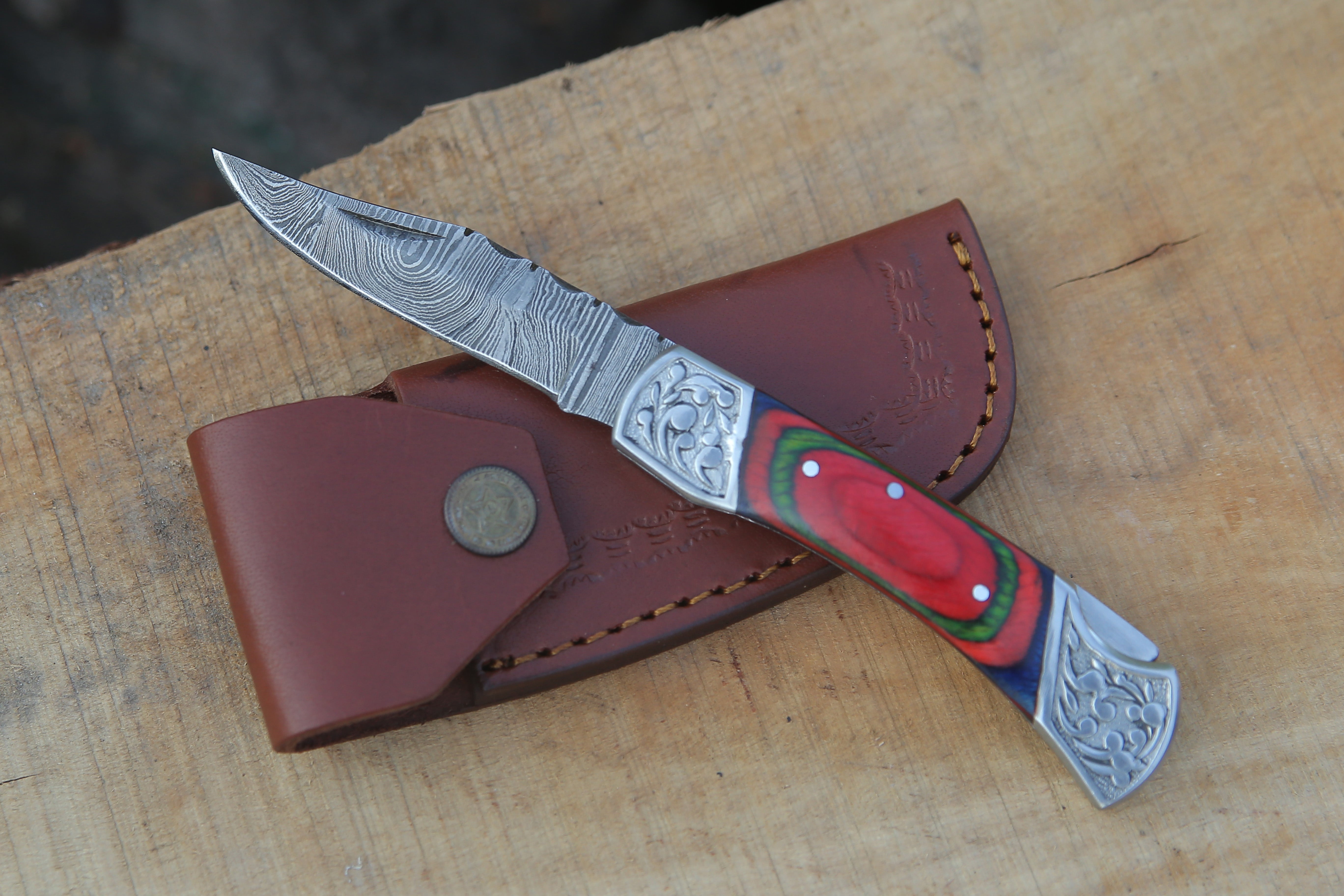 Back Lock Handmade Damascus Steel Pocket Knife Multicolor Pakka Wood Handle Folding Knife With Engraved Steel clips.