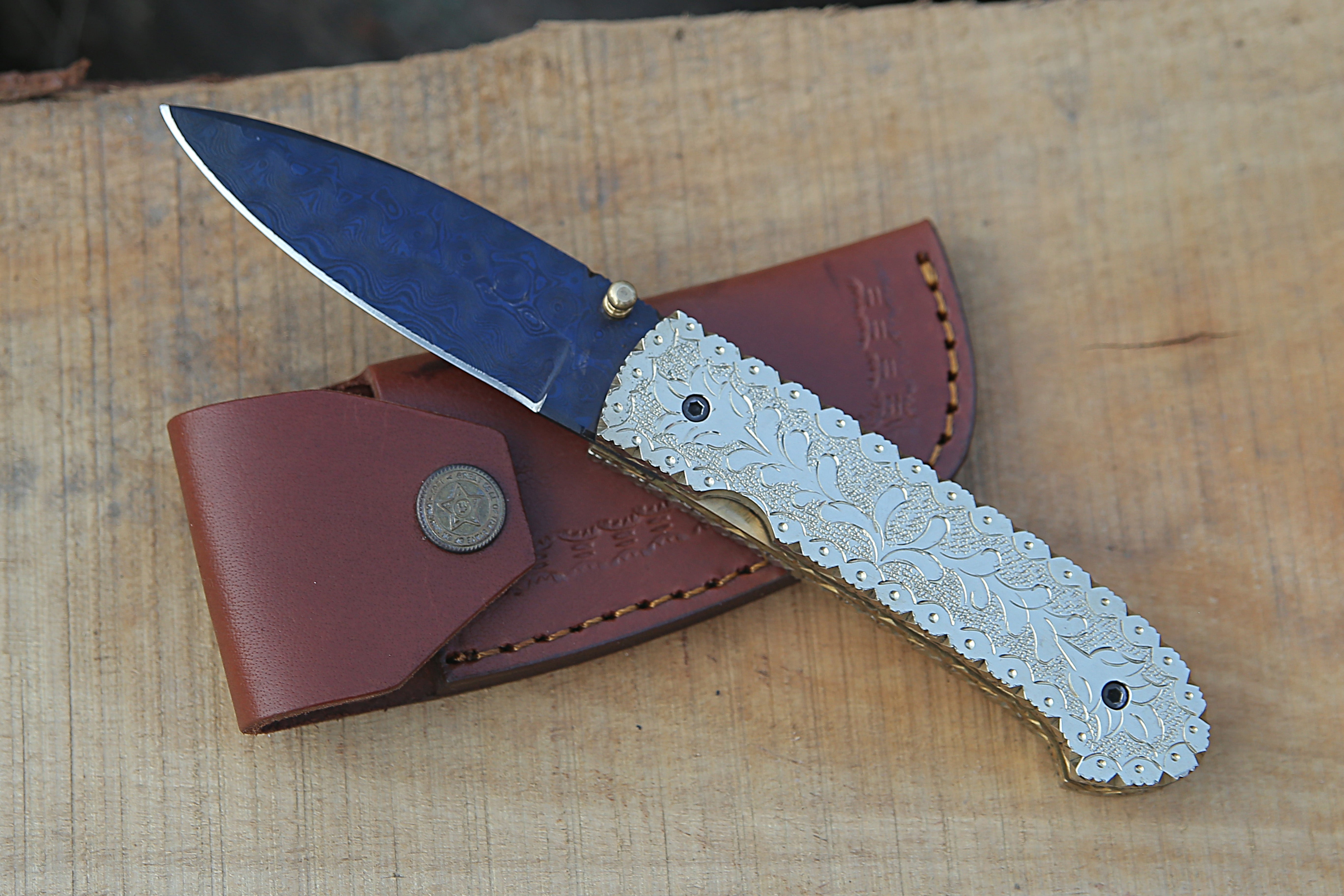 Handmade Blue Damascus Steel Liner Lock Folding Knife Brass Engraved Handle Pocket Knife Best camping Hunting Fishing EDC Tool Knife with Leather Pouch.