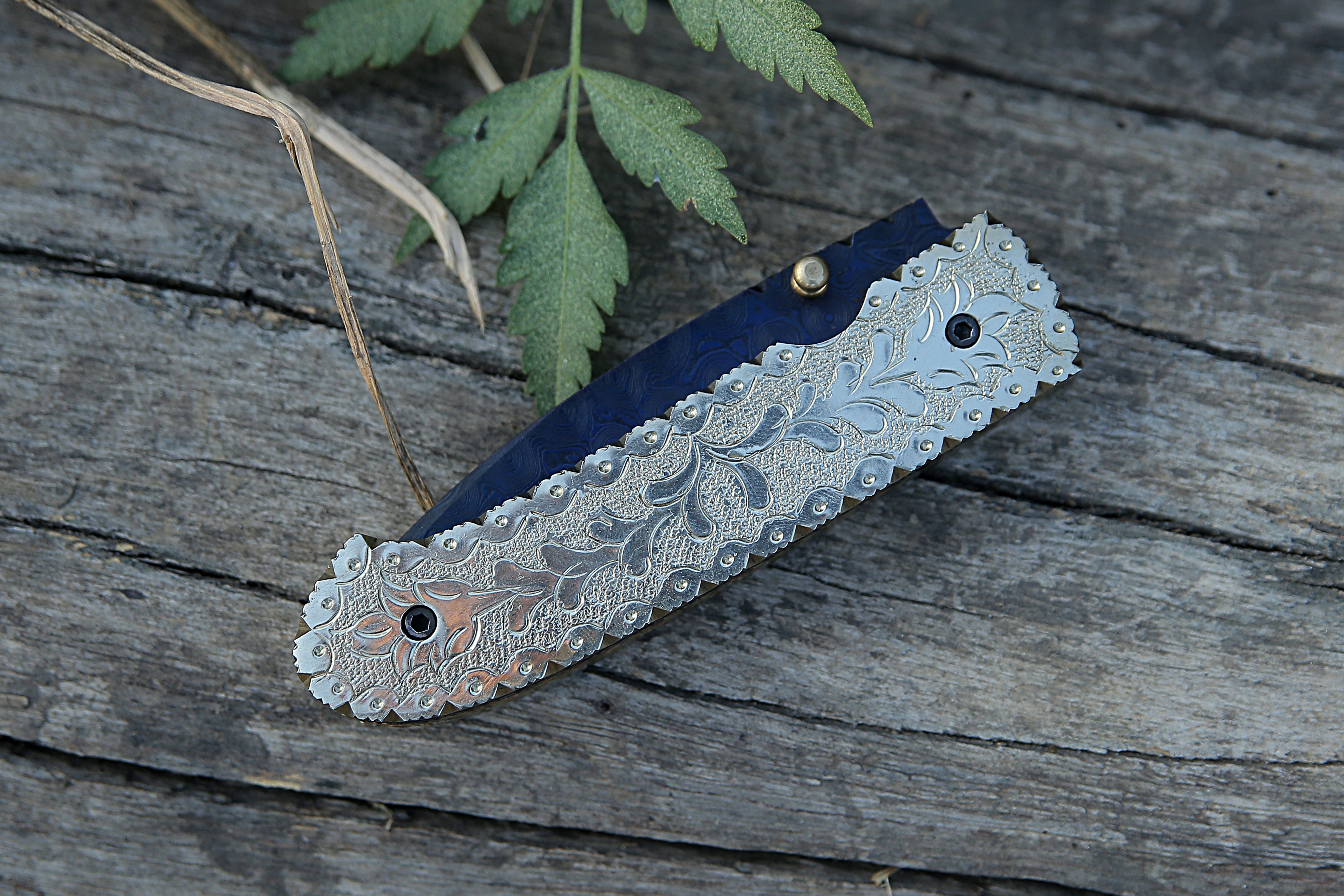 Handmade Blue Damascus Steel Liner Lock Folding Knife Brass Engraved Handle Pocket Knife Best camping Hunting Fishing EDC Tool Knife with Leather Pouch.