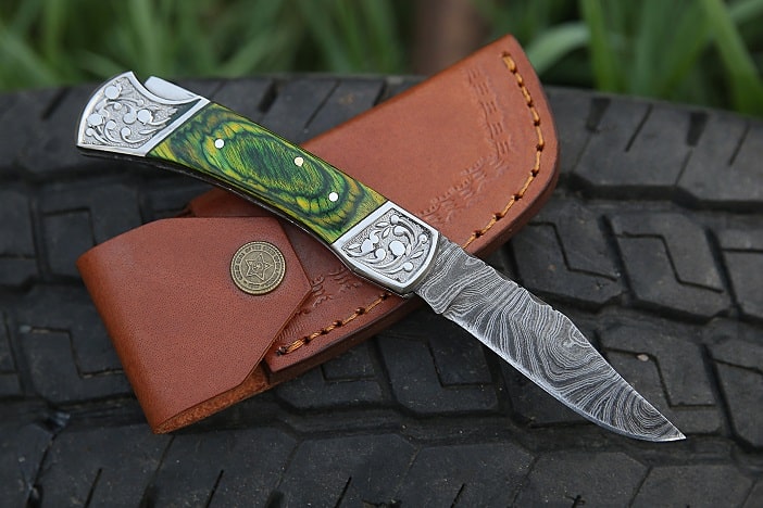 https://www.damascusknifehub.com/cdn/shop/products/green-old-timer-pocket-knife.jpg?v=1642763339